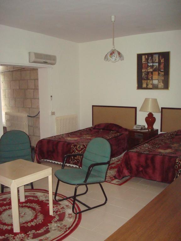 Dove Hotel Ammán Pokoj fotografie